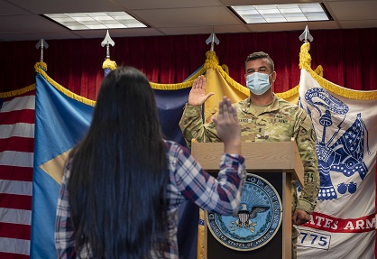 U.S. Army 1st Lt. Juan Fajardo, a native of Hamilton, N.J., administers the oath of enlistment to a future New Jersey Air National Guardsman at the Military Entrance Processing Station Fort Dix.
